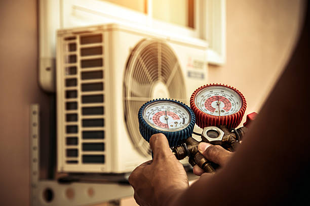 Professional Air Conditioning Service technician working in Orem, UT